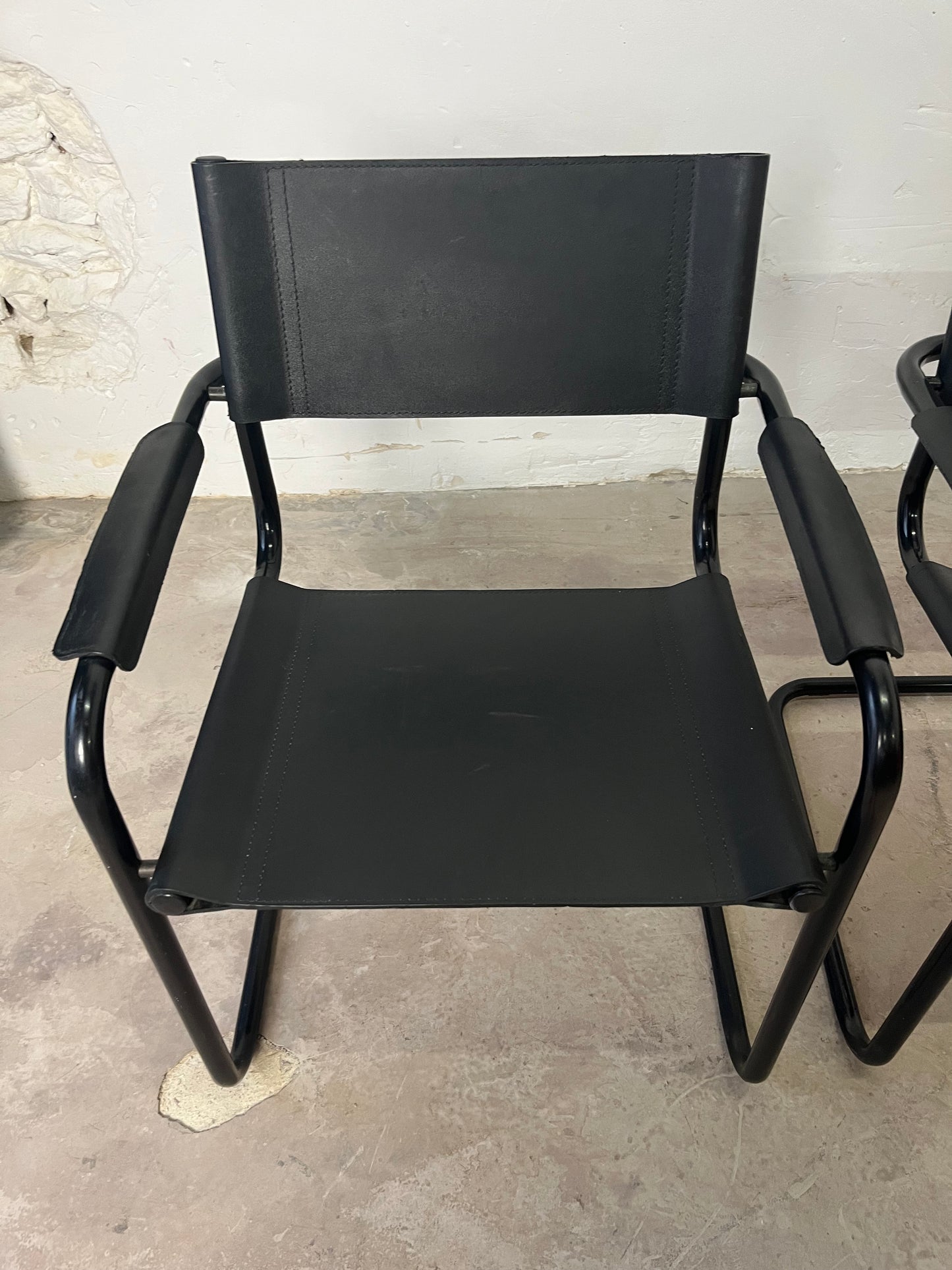 Paire de fauteuils tubulaires vintage noir